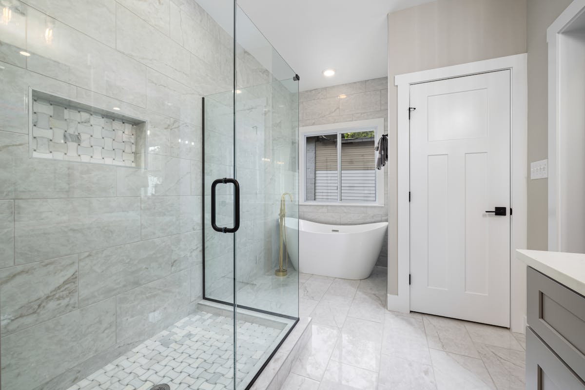 Luxury bathroom with freestanding tub in Kelowna home